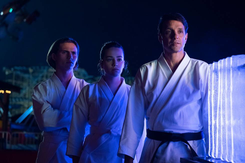 Robby (Tanner Buchanan) and Sam (Mary Mouser) are Daniel’s (Ralph Macchio) new pupils in Cobra Kai season two.